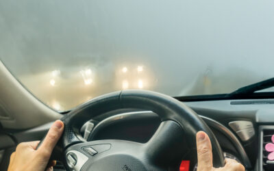 Car with Foggy Windshield and other cars in the Background