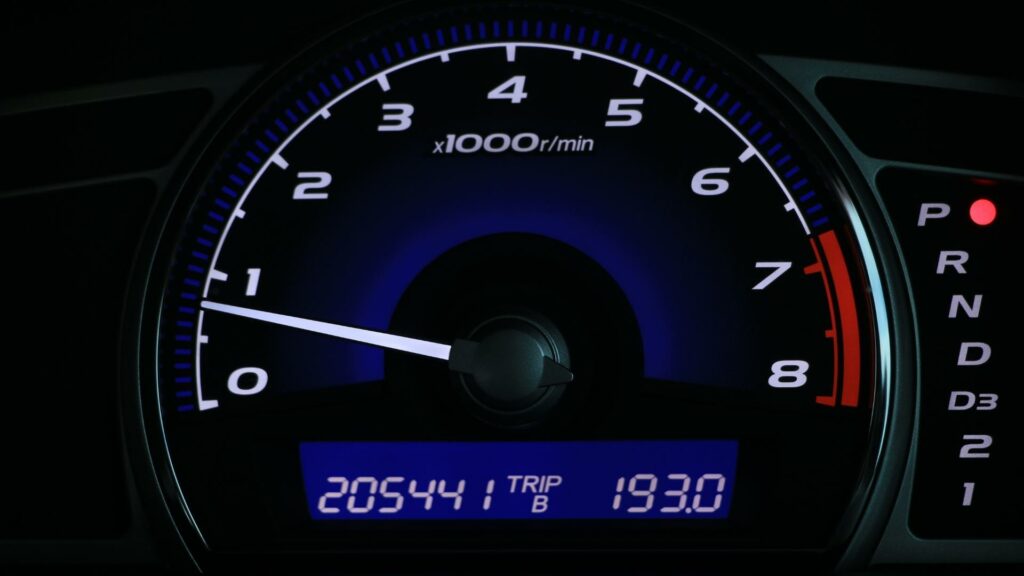 Car's dashboard with mileage screen